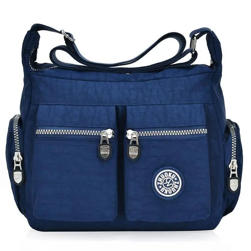 Nylonowa torebka na ramię Tilorraine crossbody — mała i solidna Niebieski