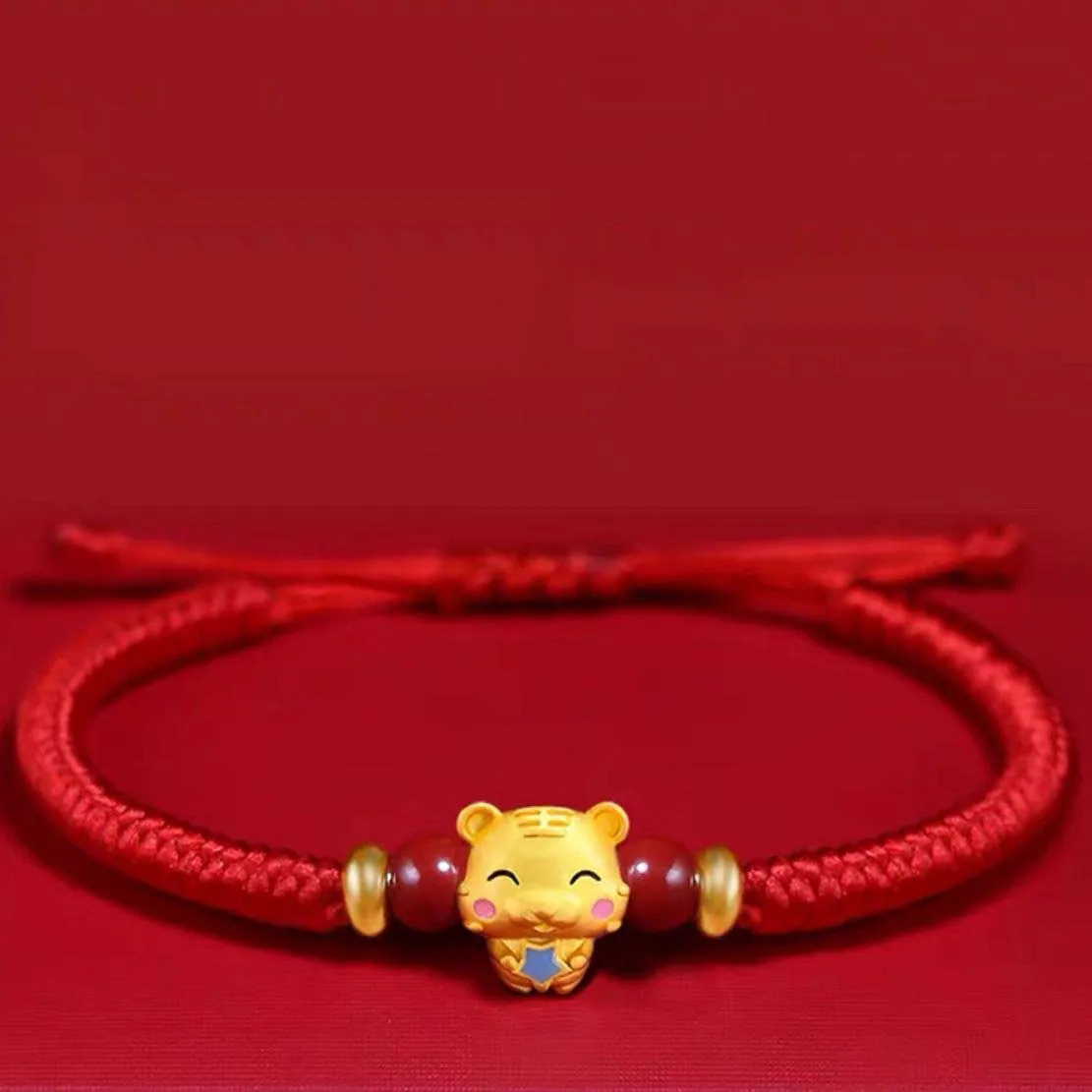 Pleciona bransoletka znak zodiaku – czerwona lina, na szczęście Ciemnozielony
