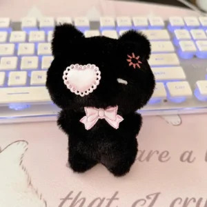 Pluszowy breloczek czarny kot z dużymi oczami kawaii Srebrny