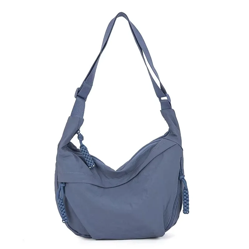 Pojemna nylonowa torba crossbody damska — tote i hobo w jednym Niebieski