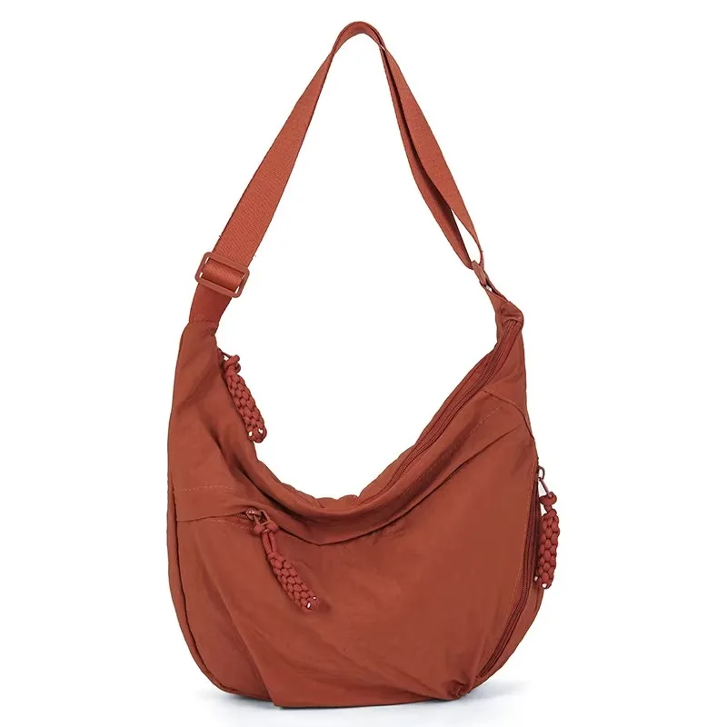 Pojemna nylonowa torba crossbody damska — tote i hobo w jednym Pomarańczowy