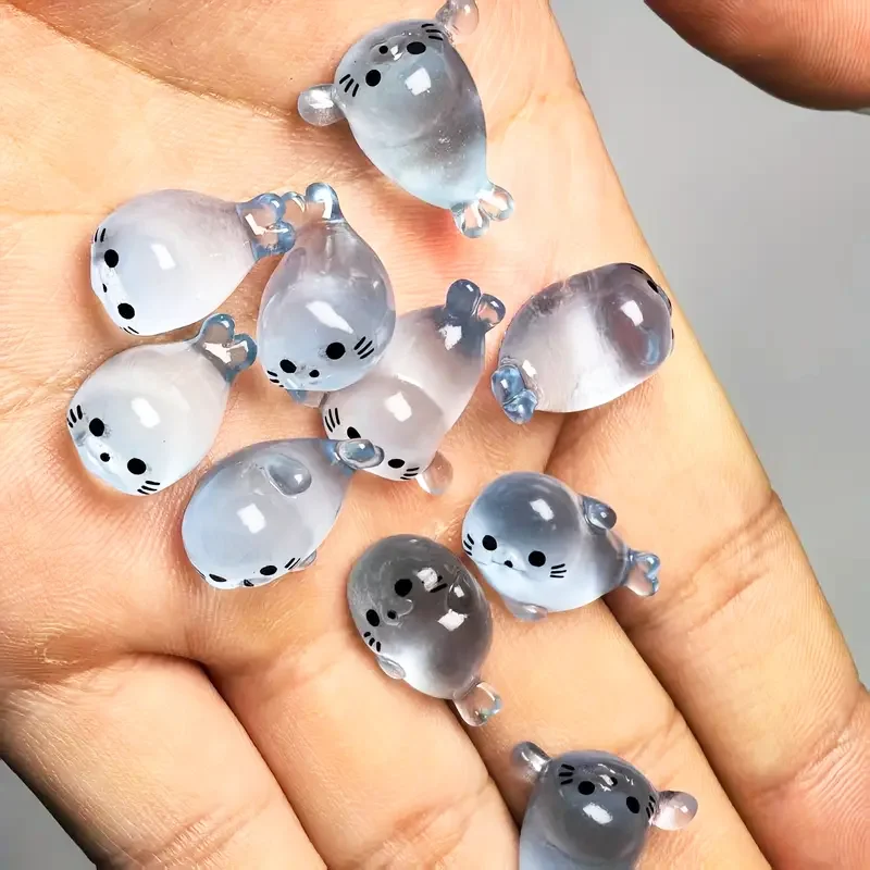 Świecące w ciemności mini figurki fok z żywicy do DIY Jasnoszary