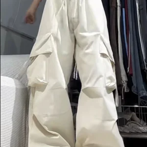 Szerokie spodnie damskie vintage baggy z kieszeniami Beżowy