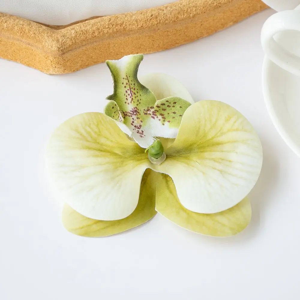 Sztuczna orchidea motylkowa — ozdoba do włosów i dekoracji Biały