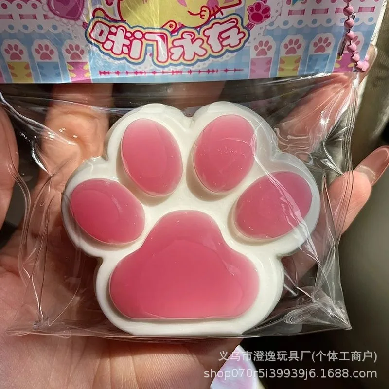 Tęczowa squishy kocia łapka - zabawka antystresowa Bordowy