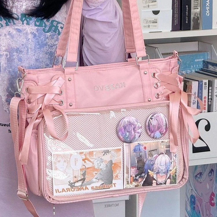 Torba ita bag crossbody w stylu college z kokardą Różowy