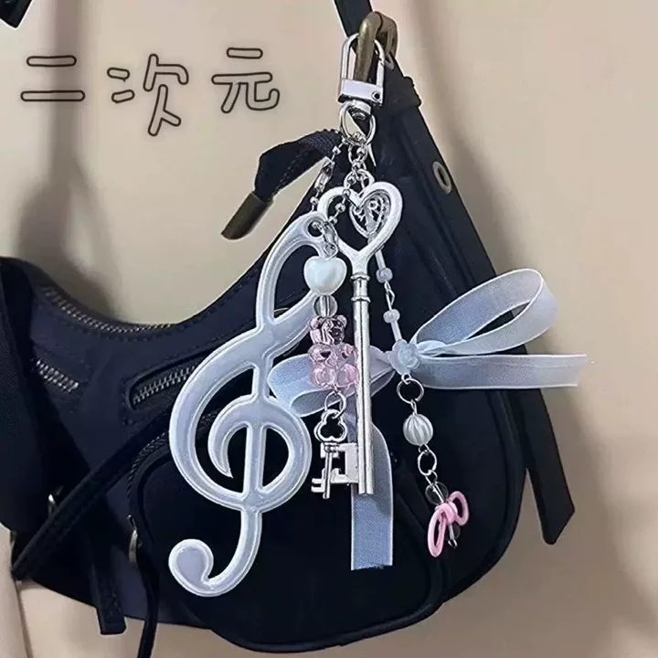 Torebka ita bag na ramię ze skrzydełkami Niebieski