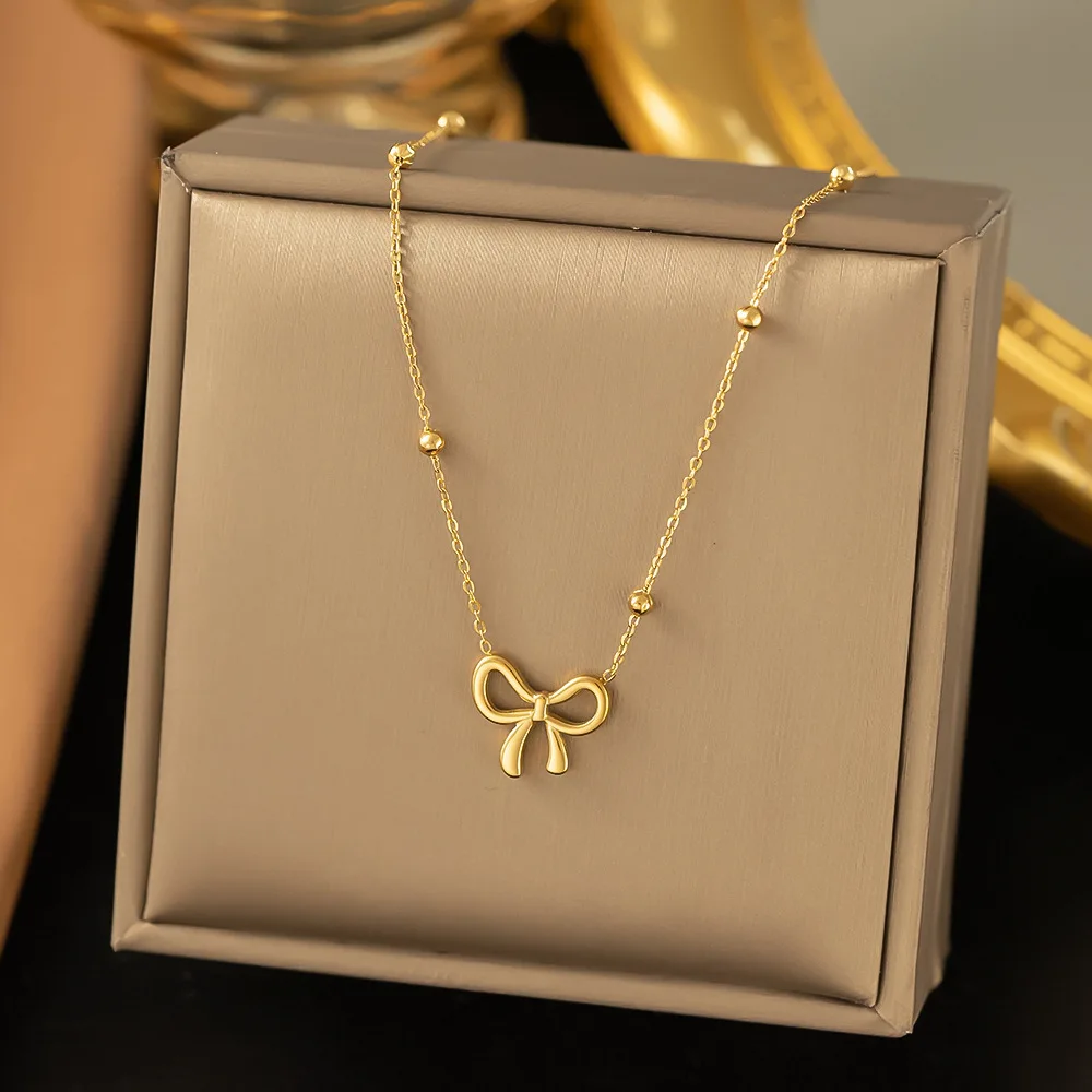 Zestaw biżuterii ze stali z kokardką - naszyjnik, bransoletka, kolczyki Dg4241 necklace