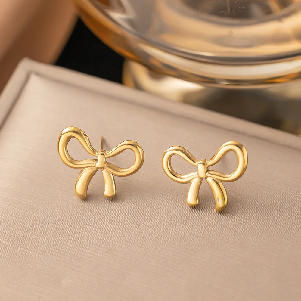 Zestaw biżuterii ze stali z kokardką - naszyjnik, bransoletka, kolczyki Dg4242 earring