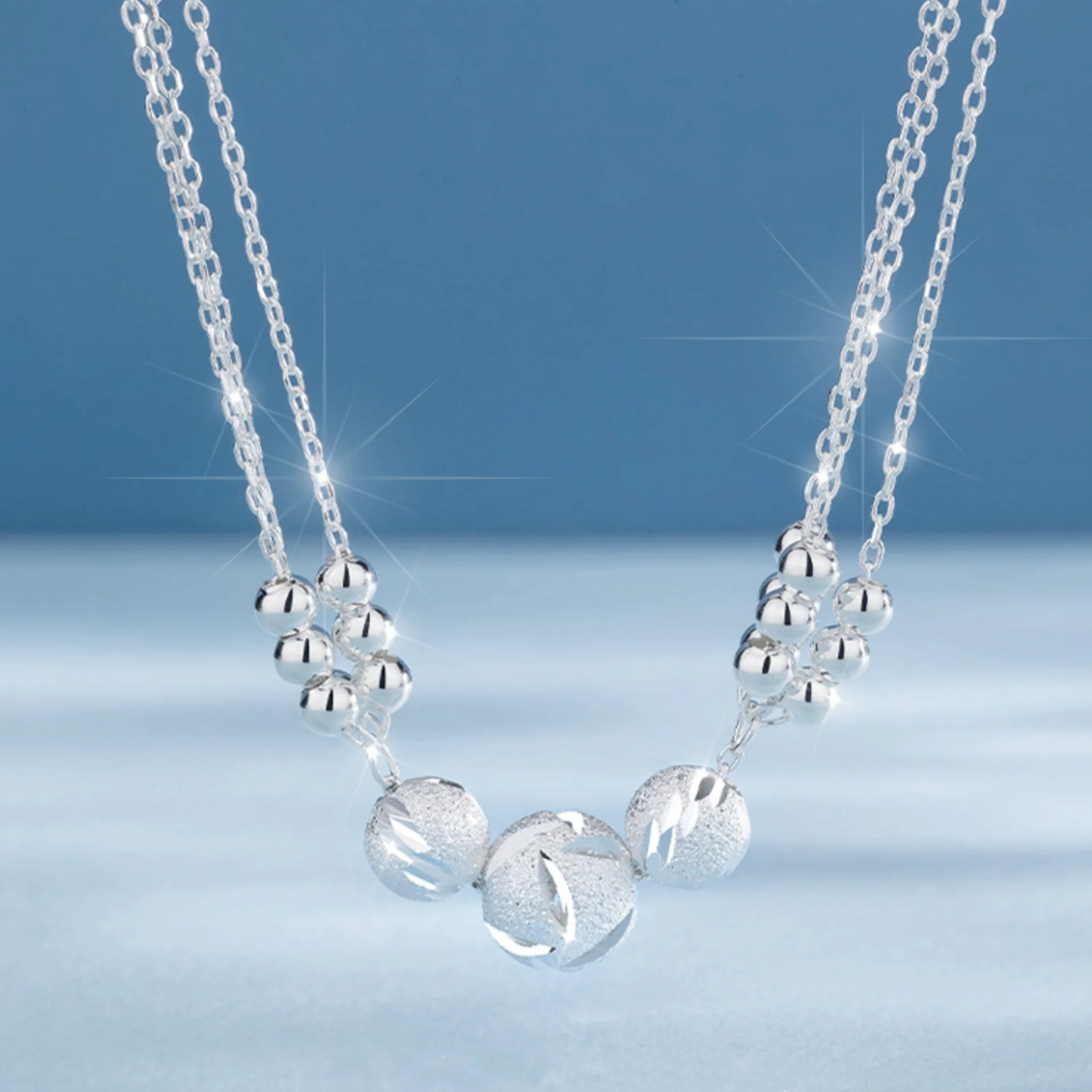 Zestaw biżuterii damskiej - naszyjnik i bransoletka z kulkami Necklace
